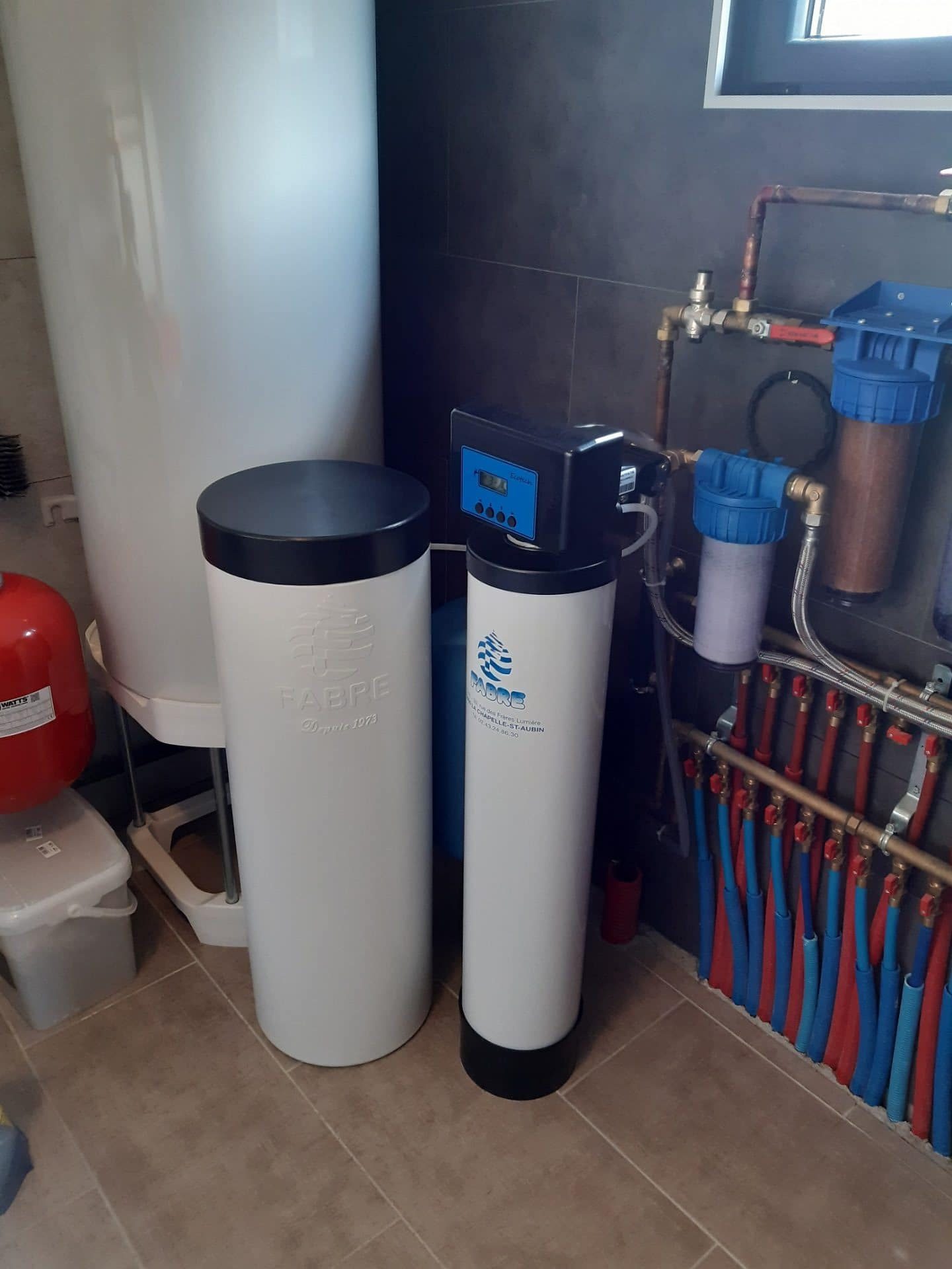 Installation d’un adoucisseur d’eau Fabre à Marchenoir (41) - Adoucisseur d'eau dans maison neuve
